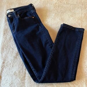 Gap 1969 dark blue 29R denim  straight leg 5 pocket jeans. Like new without tag.